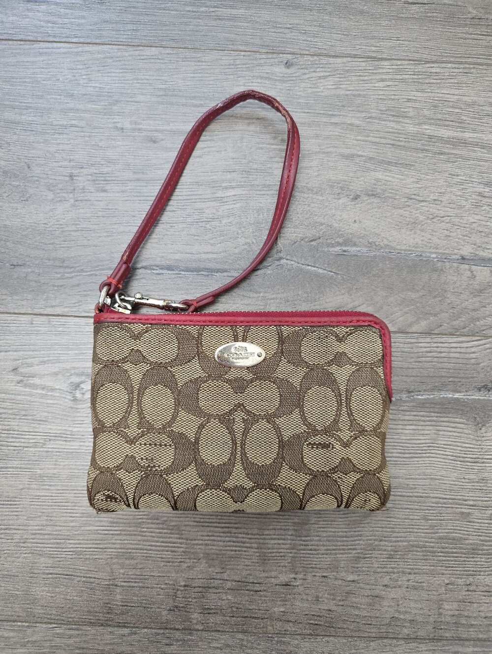 Coach Signature Corner Zip Wristlet in khaki and red